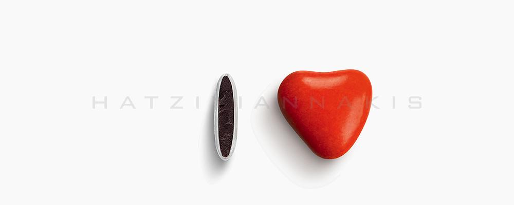 Κουφέτα Χατζηγιαννάκη Σοκολάτας Καρδιά 1102_111 με χρώμα κόκκινο, γυαλισμένο - συσκευασία ενός κιλού 1kg - για τις μπομπονιέρες του γάμου σας ή της βάπτισης του παιδιού σας